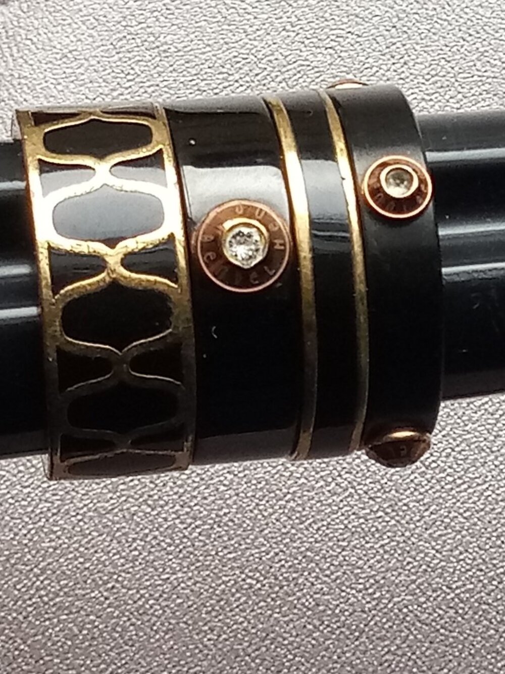 Henri Bendel  lot of 4 stackable rings black enamel